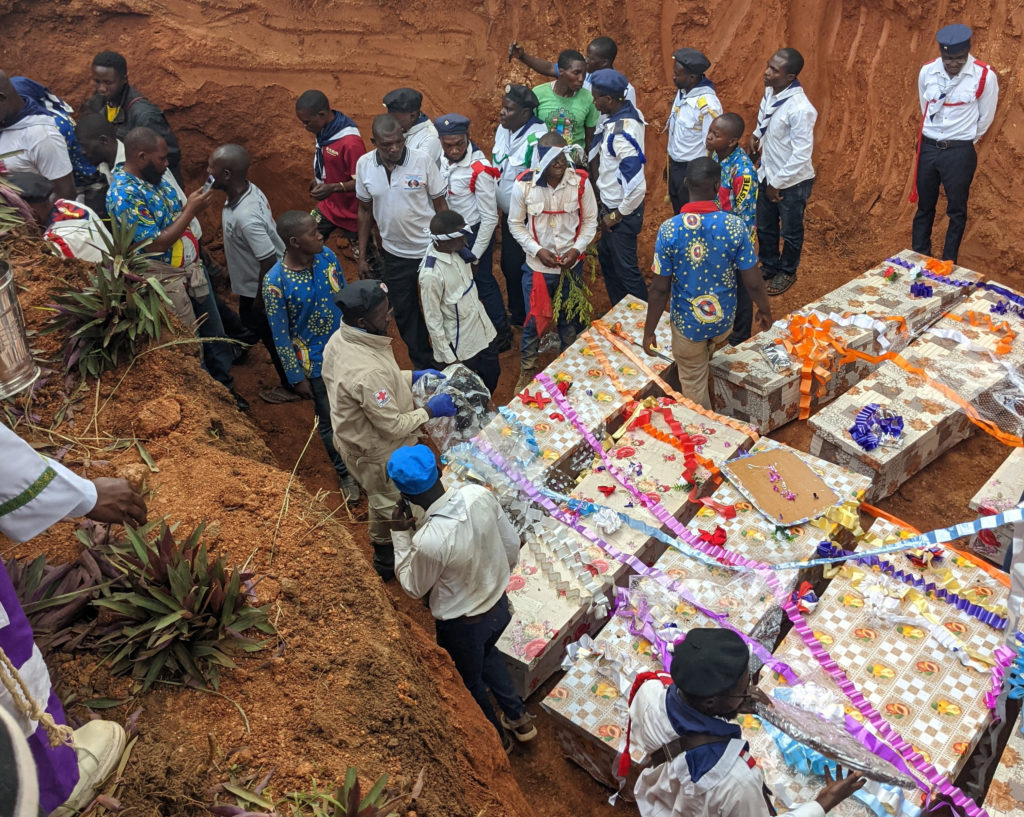 Civilians bury the remains of people killed in an attack carried out by Islamic State-affiliated Allied Democratic Forces (ADF) at a church, in Komanda near Ituri's provincial capital of Bunia, northeastern Democratic Republic of Congo, July 28, 2025. REUTERS/Stringer